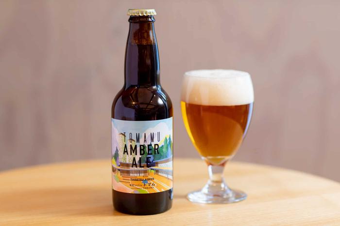 琥珀色のエールビール「トマムアンバーエール」（大雪地ビール）