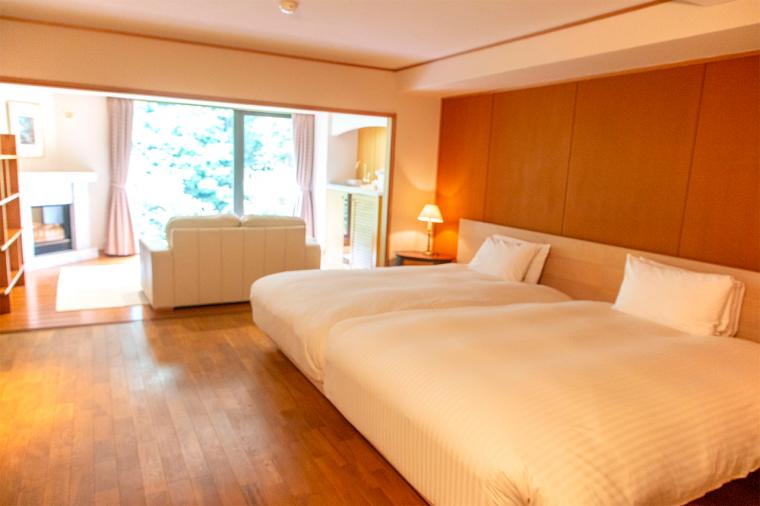 扉温泉 明神館 川の流れに耳を澄まして。客室「お鷹棟 洋室」