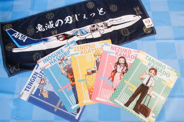 「フェイスタオル 鬼滅の刃じぇっと 特製ステッカー付き」「クリアファイル5枚セット 特製ステッカー付き」